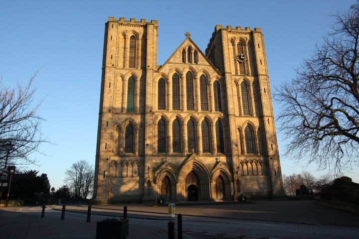 a cathedral with a large clock tower